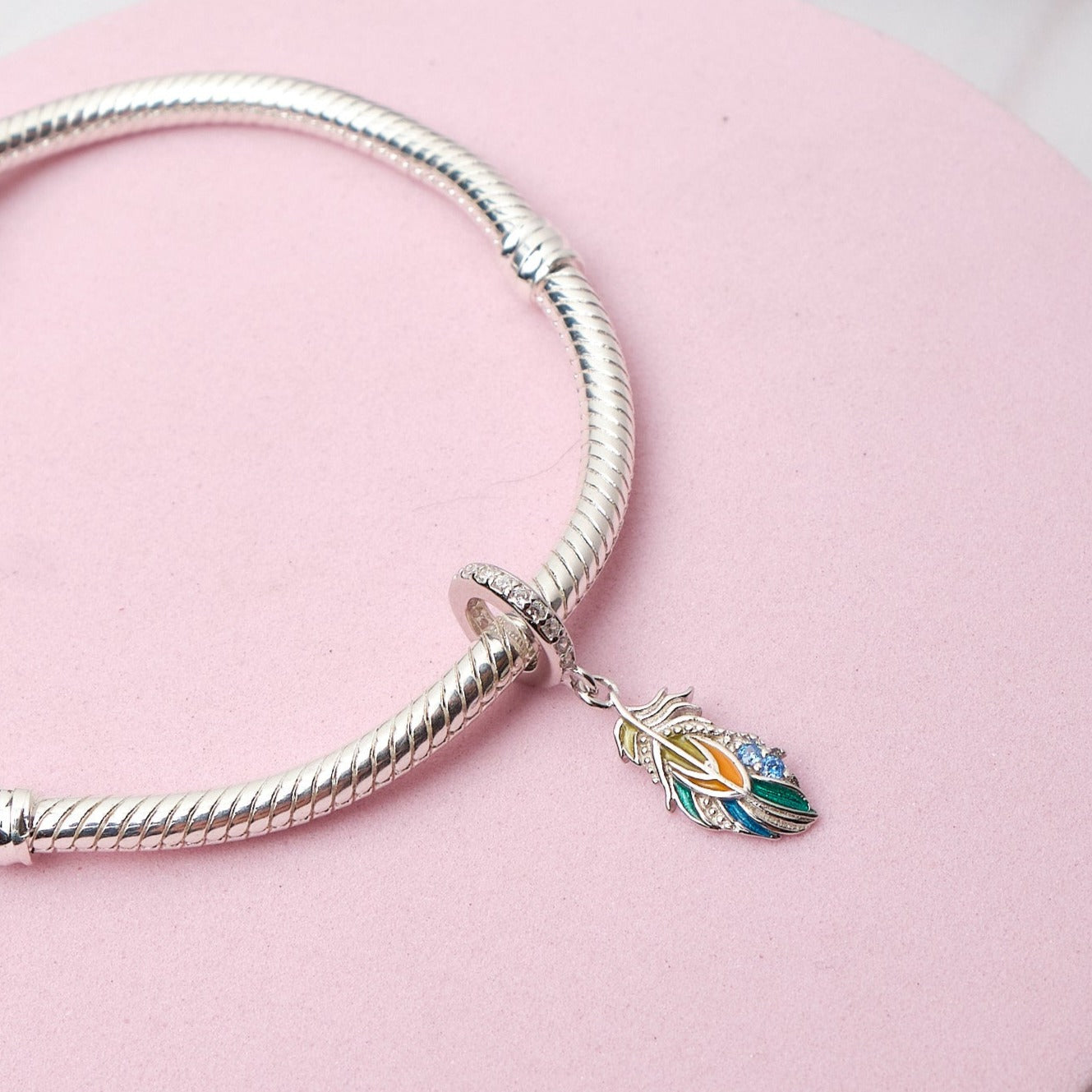 Charm Pluma